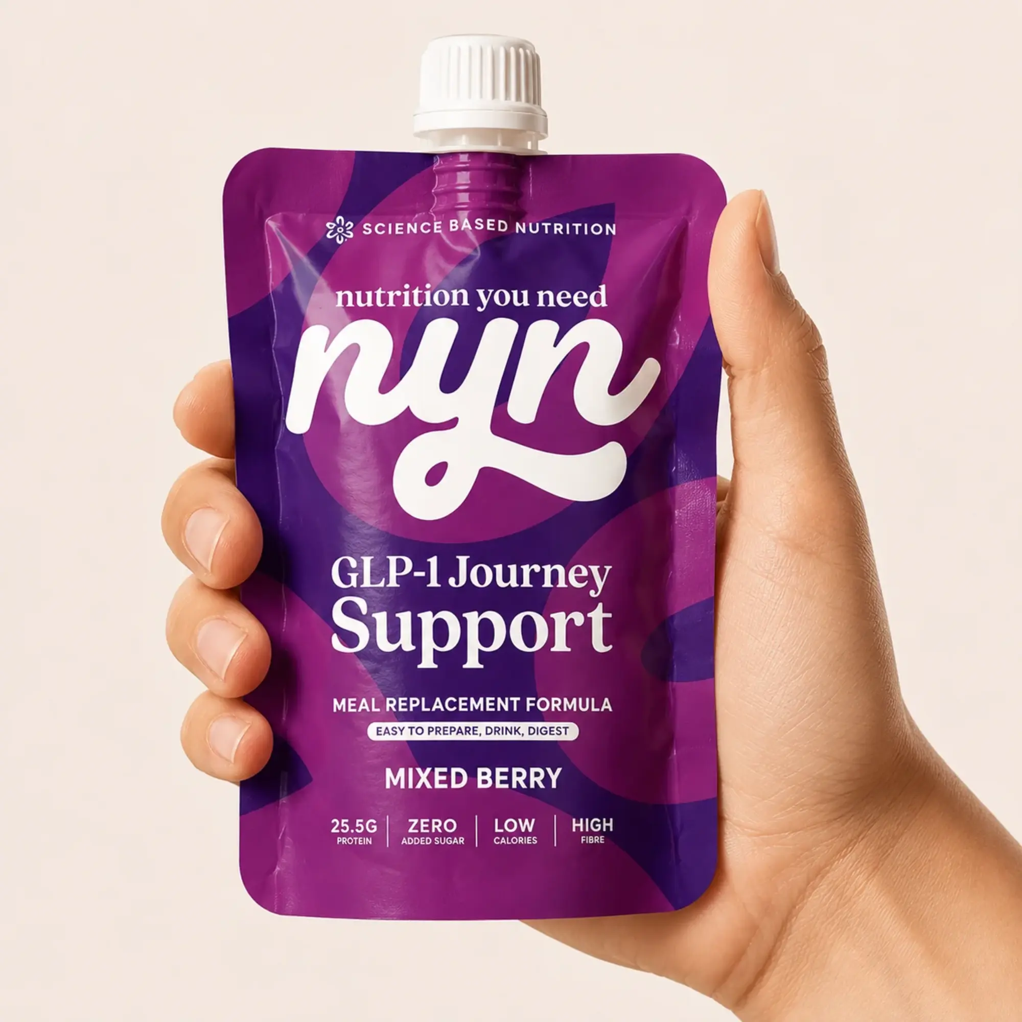 Nyn GLP-1 Journey Support Mixed Berry meal replacement pouch held in hand Peoples CBD - Make Life Better Everyday!